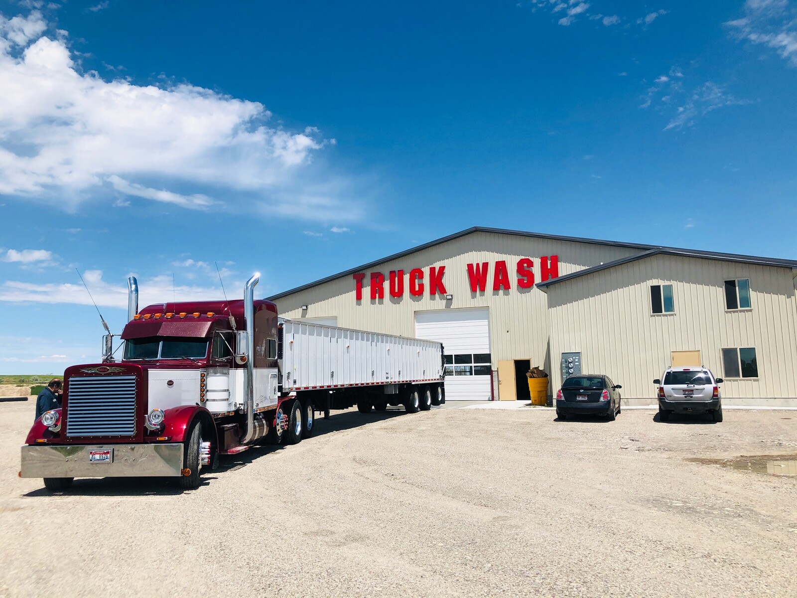 Truck Wash building with sunset