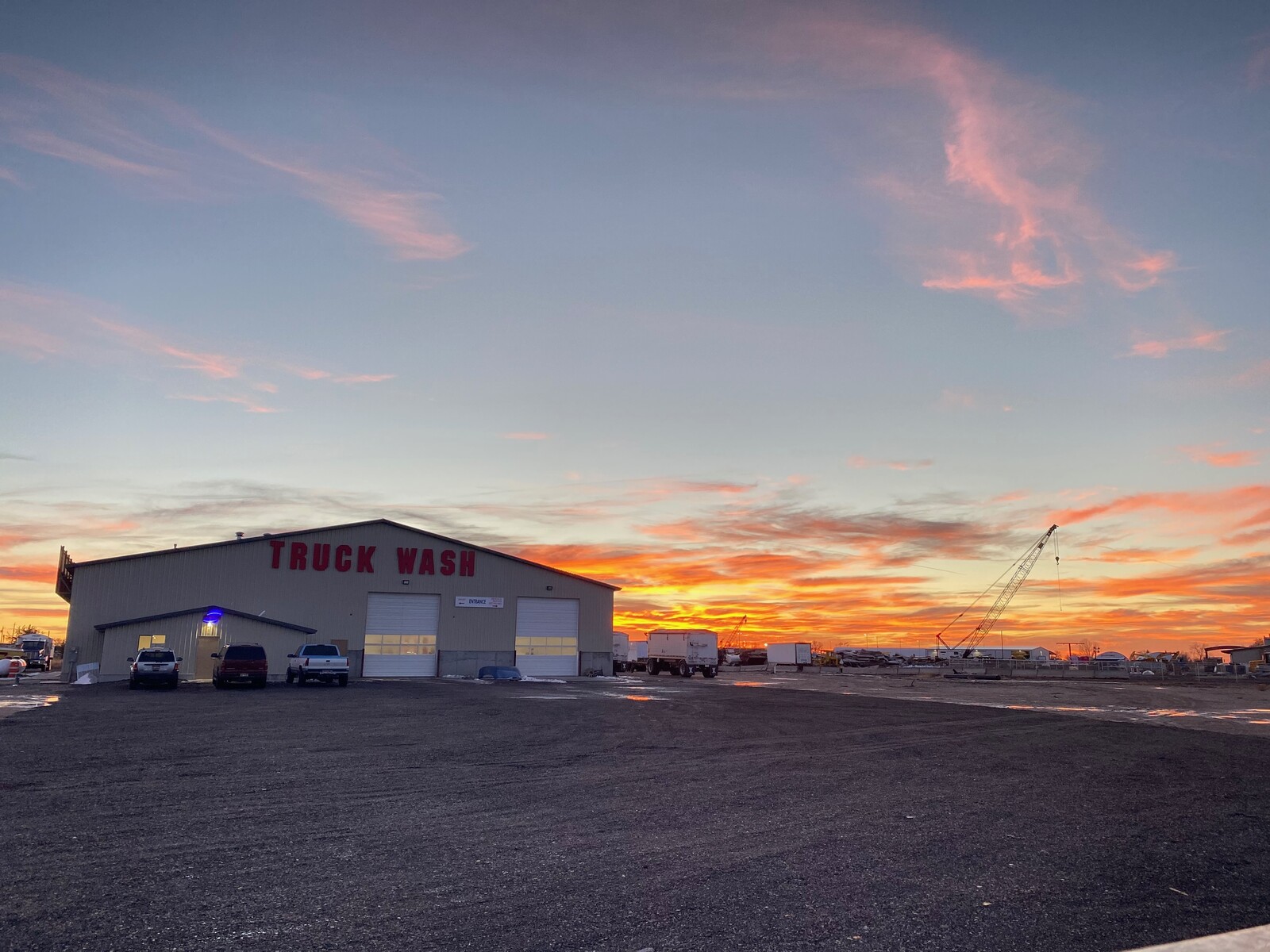 Truck Wash building with sunset